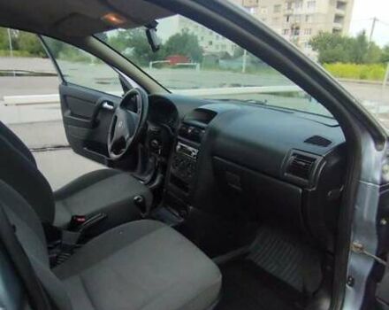 Серый Опель Астра, объемом двигателя 1.39 л и пробегом 145 тыс. км за 3900 $, фото 8 на Automoto.ua