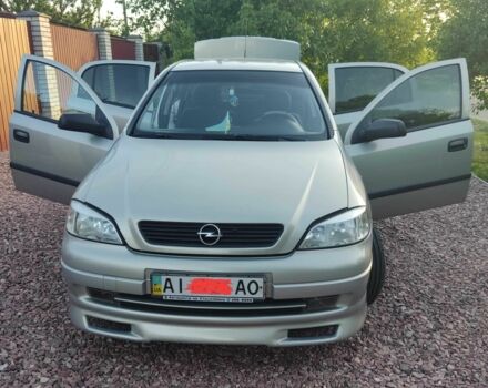 Серый Опель Астра, объемом двигателя 1.4 л и пробегом 338 тыс. км за 4100 $, фото 5 на Automoto.ua