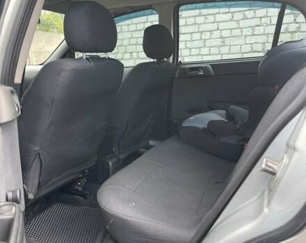 Серый Опель Астра, объемом двигателя 1.4 л и пробегом 172 тыс. км за 3500 $, фото 4 на Automoto.ua