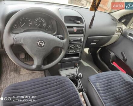 Серый Опель Астра, объемом двигателя 1.4 л и пробегом 216 тыс. км за 3800 $, фото 6 на Automoto.ua