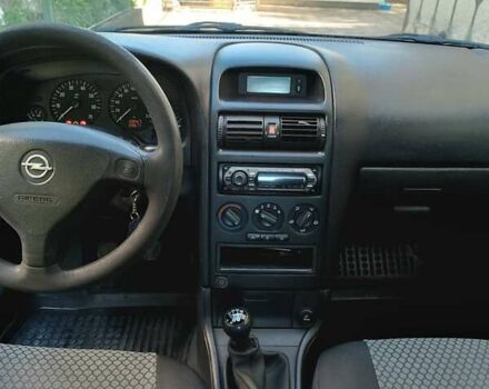 Серый Опель Астра, объемом двигателя 1.4 л и пробегом 189 тыс. км за 3900 $, фото 14 на Automoto.ua