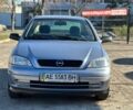 Серый Опель Астра, объемом двигателя 1.4 л и пробегом 116 тыс. км за 4699 $, фото 2 на Automoto.ua