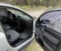 Серый Опель Астра, объемом двигателя 1.4 л и пробегом 195 тыс. км за 3950 $, фото 7 на Automoto.ua