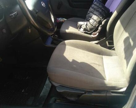 Серый Опель Астра, объемом двигателя 1.4 л и пробегом 278 тыс. км за 4000 $, фото 9 на Automoto.ua