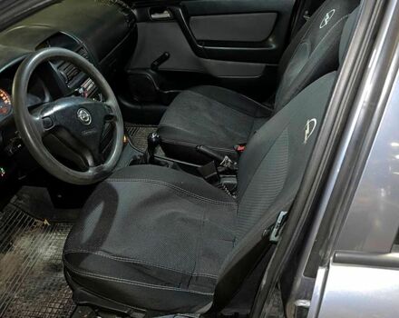 Серый Опель Астра, объемом двигателя 1.4 л и пробегом 263 тыс. км за 2700 $, фото 2 на Automoto.ua