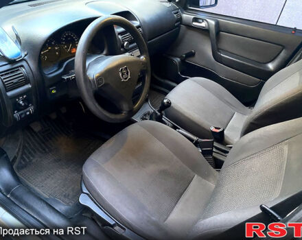 Серый Опель Астра, объемом двигателя 1.4 л и пробегом 200 тыс. км за 3500 $, фото 7 на Automoto.ua