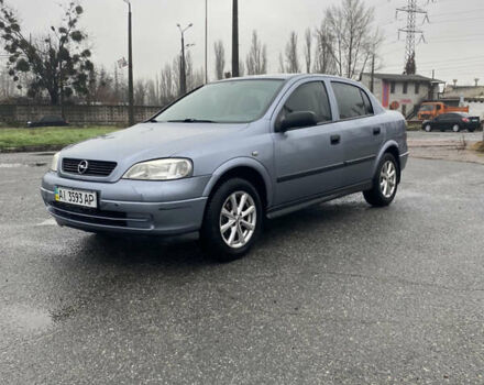 Серый Опель Астра, объемом двигателя 1.4 л и пробегом 283 тыс. км за 3200 $, фото 4 на Automoto.ua