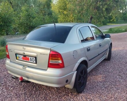 Серый Опель Астра, объемом двигателя 1.4 л и пробегом 338 тыс. км за 4100 $, фото 4 на Automoto.ua