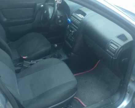 Серый Опель Астра, объемом двигателя 1.4 л и пробегом 230 тыс. км за 2800 $, фото 1 на Automoto.ua