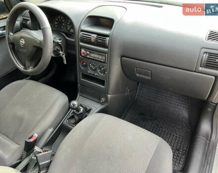 Серый Опель Астра, объемом двигателя 1.36 л и пробегом 77 тыс. км за 3999 $, фото 50 на Automoto.ua