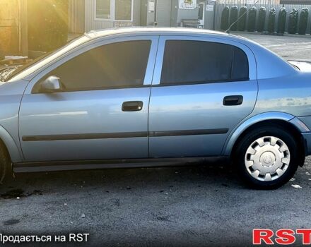 Серый Опель Астра, объемом двигателя 1.4 л и пробегом 350 тыс. км за 4000 $, фото 3 на Automoto.ua