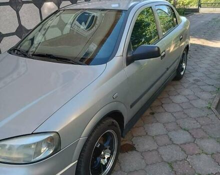 Серый Опель Астра, объемом двигателя 1.4 л и пробегом 189 тыс. км за 3900 $, фото 4 на Automoto.ua