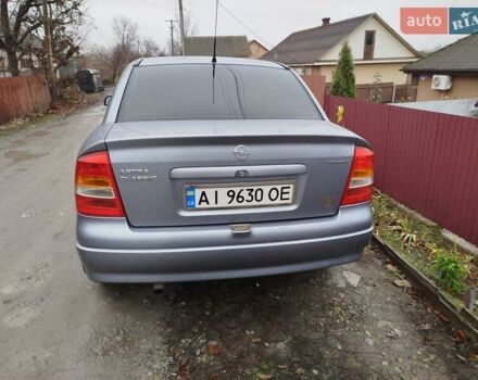 Серый Опель Астра, объемом двигателя 1.4 л и пробегом 197 тыс. км за 3350 $, фото 7 на Automoto.ua