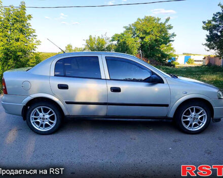 Серый Опель Астра, объемом двигателя 1.4 л и пробегом 198 тыс. км за 3500 $, фото 2 на Automoto.ua