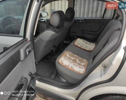 Серый Опель Астра, объемом двигателя 1.4 л и пробегом 216 тыс. км за 3800 $, фото 9 на Automoto.ua