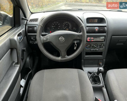Серый Опель Астра, объемом двигателя 1.36 л и пробегом 77 тыс. км за 3999 $, фото 32 на Automoto.ua