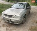 Серый Опель Астра, объемом двигателя 1.4 л и пробегом 250 тыс. км за 2400 $, фото 1 на Automoto.ua