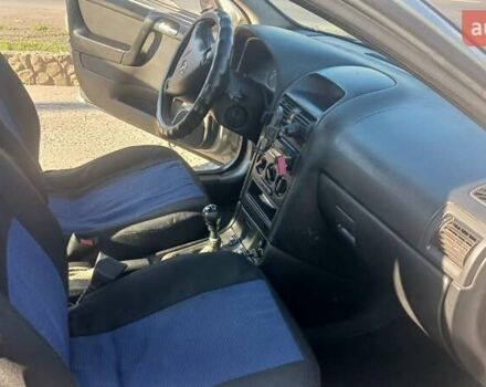 Серый Опель Астра, объемом двигателя 1.4 л и пробегом 400 тыс. км за 2300 $, фото 12 на Automoto.ua