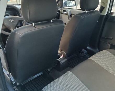 Серый Опель Астра, объемом двигателя 1.4 л и пробегом 189 тыс. км за 3900 $, фото 10 на Automoto.ua