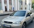 Серый Опель Астра, объемом двигателя 1.4 л и пробегом 260 тыс. км за 3590 $, фото 1 на Automoto.ua