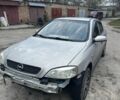 Серый Опель Астра, объемом двигателя 1.4 л и пробегом 220 тыс. км за 600 $, фото 4 на Automoto.ua