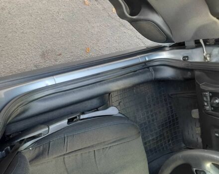 Серый Опель Астра, объемом двигателя 1.4 л и пробегом 282 тыс. км за 3700 $, фото 12 на Automoto.ua