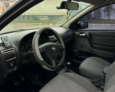 Серый Опель Астра, объемом двигателя 1.4 л и пробегом 185 тыс. км за 4500 $, фото 2 на Automoto.ua