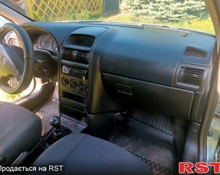 Серый Опель Астра, объемом двигателя 1.4 л и пробегом 218 тыс. км за 3499 $, фото 5 на Automoto.ua