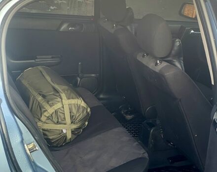 Серый Опель Астра, объемом двигателя 1.4 л и пробегом 350 тыс. км за 4000 $, фото 6 на Automoto.ua