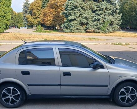 Серый Опель Астра, объемом двигателя 1.4 л и пробегом 260 тыс. км за 3590 $, фото 5 на Automoto.ua