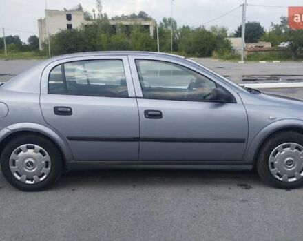 Серый Опель Астра, объемом двигателя 1.39 л и пробегом 145 тыс. км за 3900 $, фото 9 на Automoto.ua