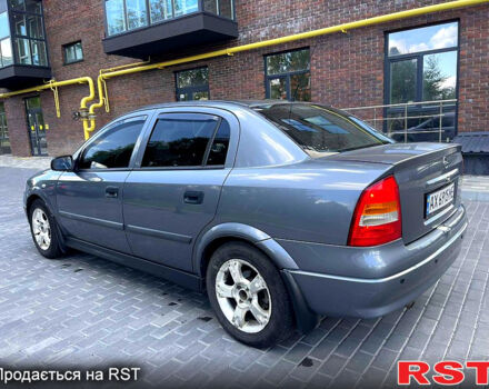 Серый Опель Астра, объемом двигателя 1.4 л и пробегом 250 тыс. км за 2999 $, фото 4 на Automoto.ua