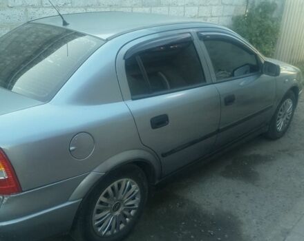 Серый Опель Астра, объемом двигателя 1.4 л и пробегом 230 тыс. км за 2800 $, фото 2 на Automoto.ua