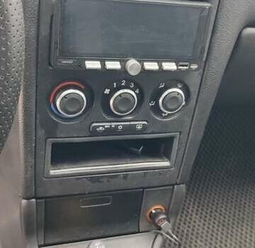 Серый Опель Астра, объемом двигателя 1.4 л и пробегом 156 тыс. км за 4500 $, фото 47 на Automoto.ua