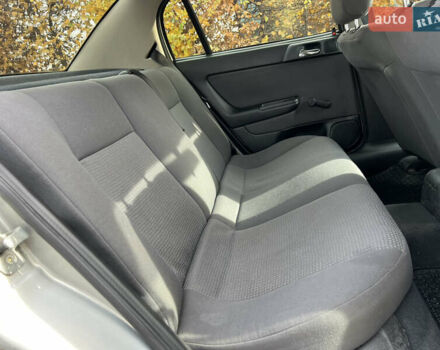 Серый Опель Астра, объемом двигателя 1.36 л и пробегом 77 тыс. км за 3999 $, фото 46 на Automoto.ua