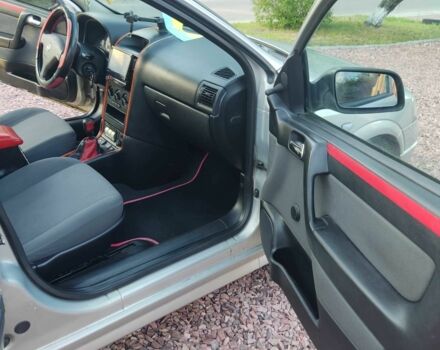 Серый Опель Астра, объемом двигателя 1.4 л и пробегом 338 тыс. км за 4100 $, фото 7 на Automoto.ua