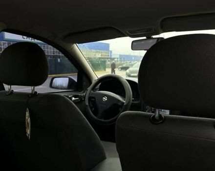 Серый Опель Астра, объемом двигателя 1.4 л и пробегом 185 тыс. км за 4500 $, фото 7 на Automoto.ua