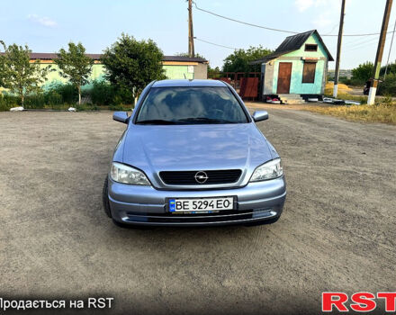 Серый Опель Астра, объемом двигателя 1.4 л и пробегом 200 тыс. км за 3600 $, фото 2 на Automoto.ua