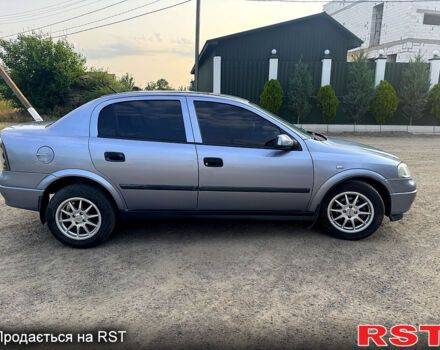 Серый Опель Астра, объемом двигателя 1.4 л и пробегом 200 тыс. км за 3600 $, фото 3 на Automoto.ua