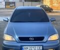 Серый Опель Астра, объемом двигателя 1.4 л и пробегом 350 тыс. км за 4000 $, фото 1 на Automoto.ua