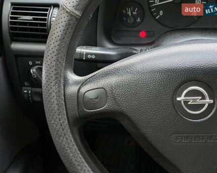 Серый Опель Астра, объемом двигателя 1.36 л и пробегом 77 тыс. км за 3999 $, фото 34 на Automoto.ua