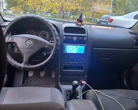 Серый Опель Астра, объемом двигателя 1.6 л и пробегом 173 тыс. км за 4000 $, фото 4 на Automoto.ua