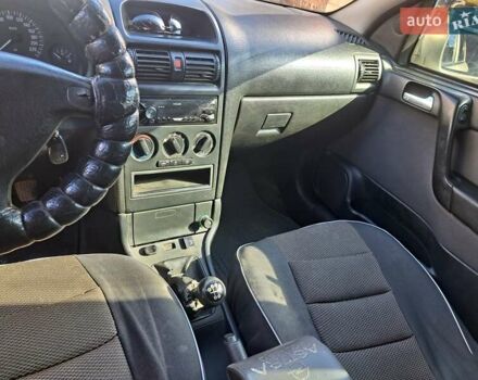 Серый Опель Астра, объемом двигателя 1.6 л и пробегом 300 тыс. км за 4600 $, фото 8 на Automoto.ua