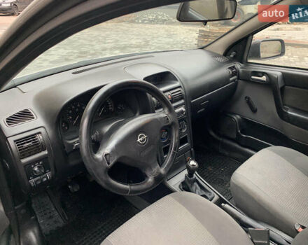 Серый Опель Астра, объемом двигателя 1.4 л и пробегом 216 тыс. км за 2650 $, фото 9 на Automoto.ua