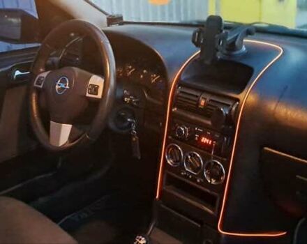 Серый Опель Астра, объемом двигателя 1.39 л и пробегом 202 тыс. км за 3000 $, фото 2 на Automoto.ua