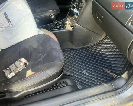 Серый Опель Астра, объемом двигателя 1.4 л и пробегом 173 тыс. км за 5500 $, фото 4 на Automoto.ua