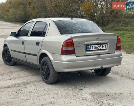Серый Опель Астра, объемом двигателя 1.4 л и пробегом 350 тыс. км за 2399 $, фото 4 на Automoto.ua