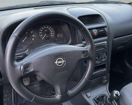 Серый Опель Астра, объемом двигателя 1.4 л и пробегом 293 тыс. км за 3600 $, фото 6 на Automoto.ua