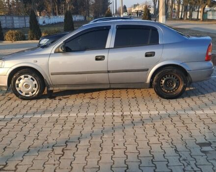 Серый Опель Астра, объемом двигателя 1.4 л и пробегом 173 тыс. км за 2900 $, фото 3 на Automoto.ua