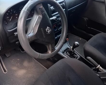 Серый Опель Астра, объемом двигателя 1.6 л и пробегом 183 тыс. км за 3600 $, фото 10 на Automoto.ua